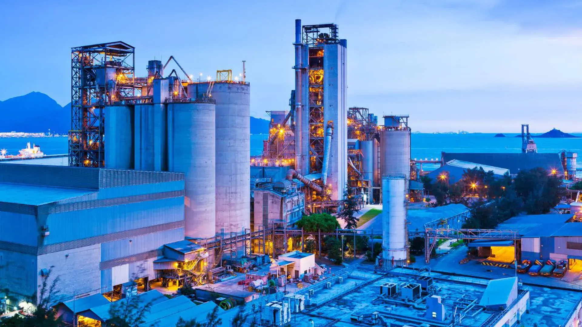Industrial plant at dusk, representing Liquidity Services marketplaces